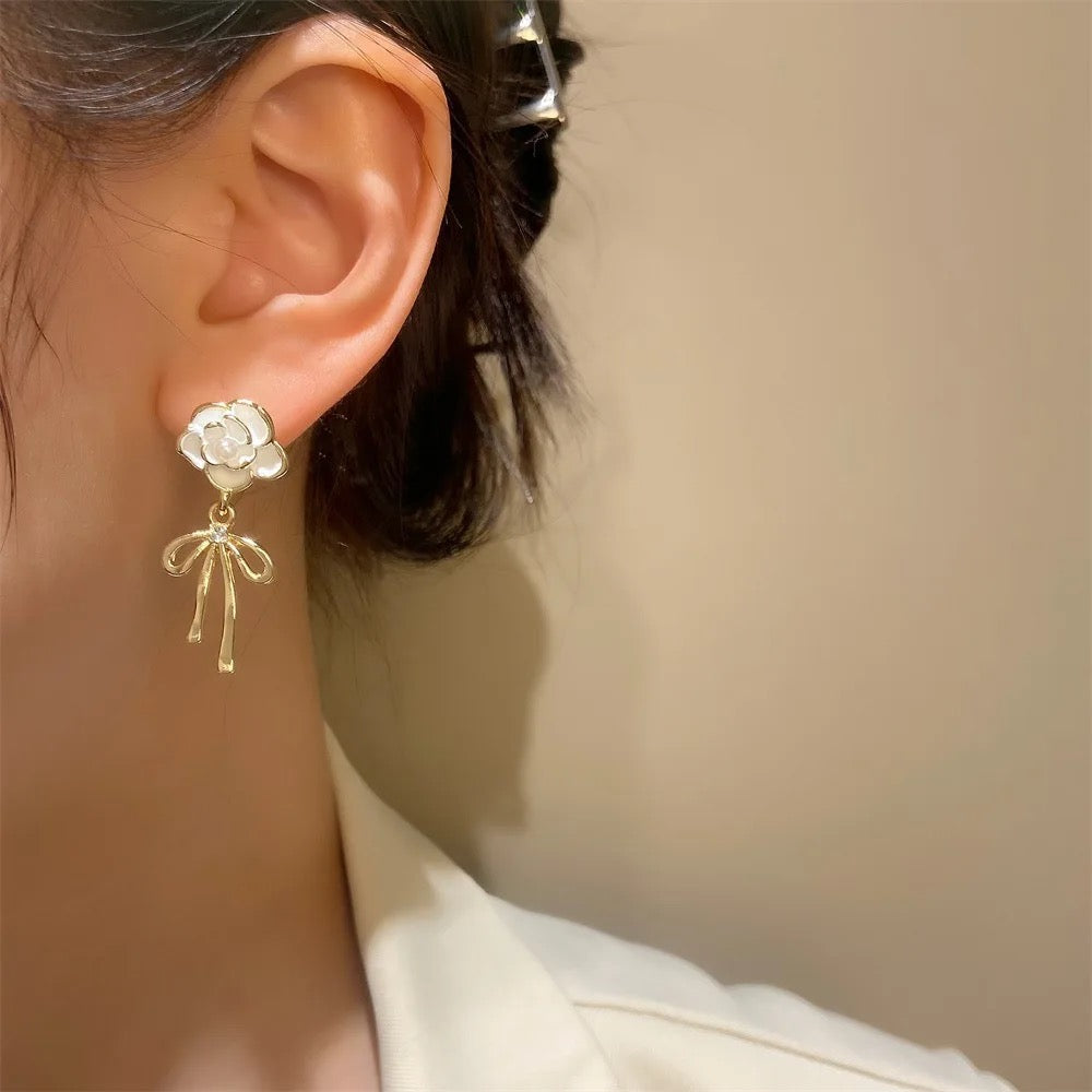 White Flower Gold Tie Drop Earrings