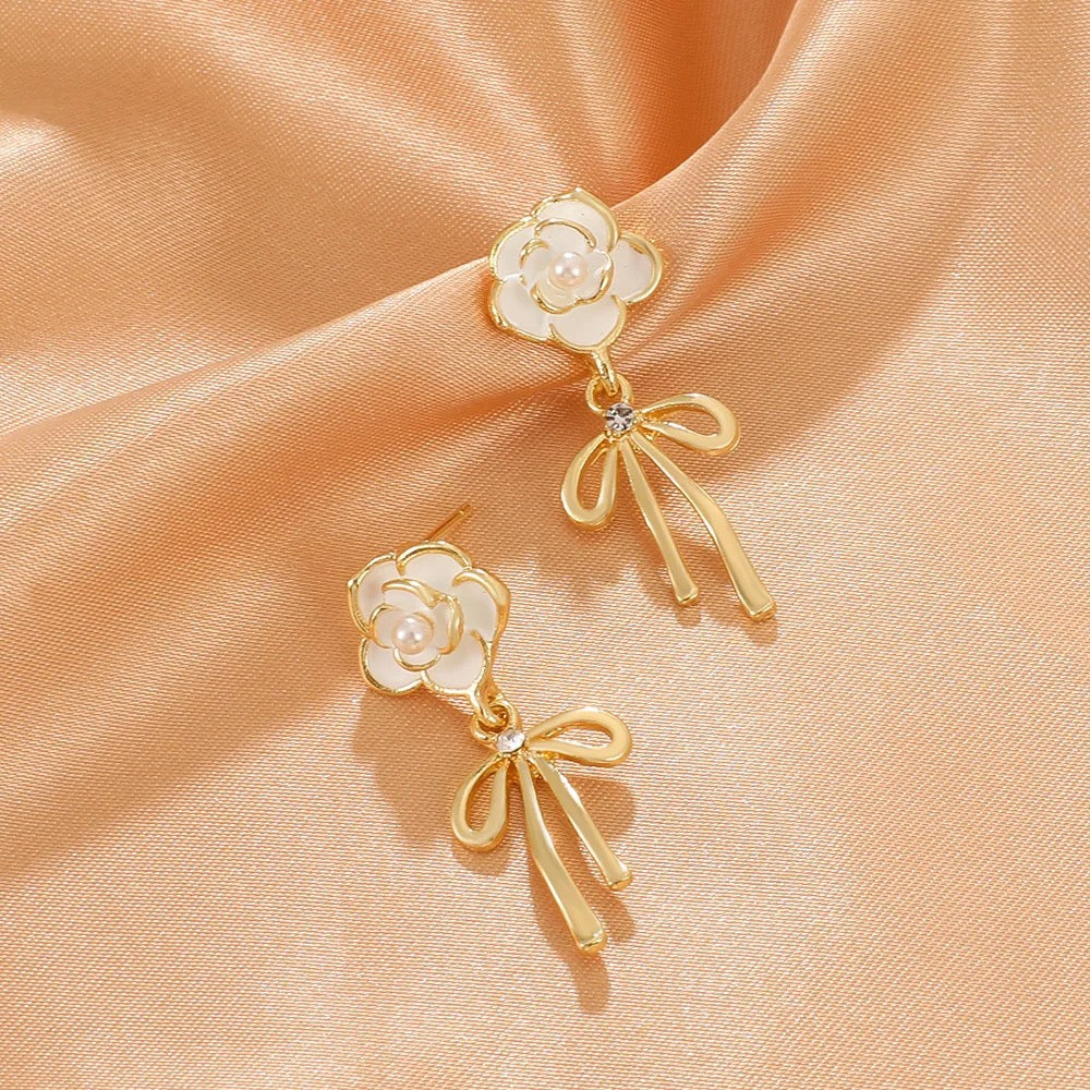 White Flower Gold Tie Drop Earrings