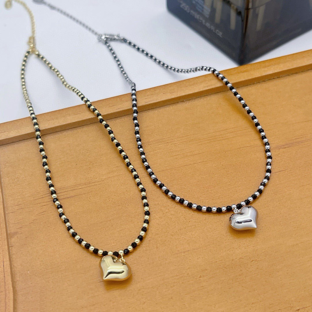Chunky Heart Gold and Black Beaded Pendant Necklace