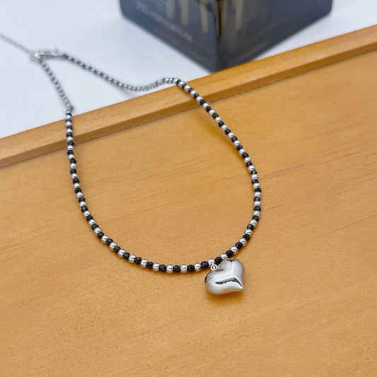 Chunky Heart Gold and Black Beaded Pendant Necklace