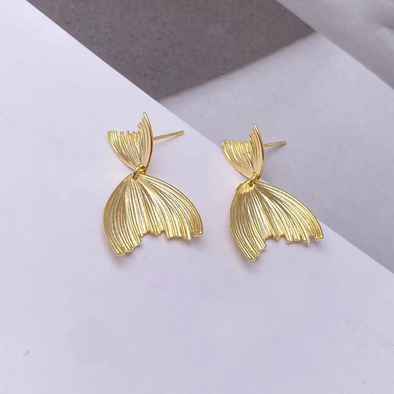 Fish leaves gold drop earrings