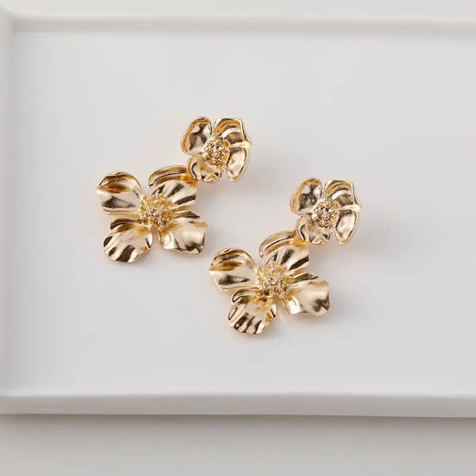 Floral wavy gold drop earrings