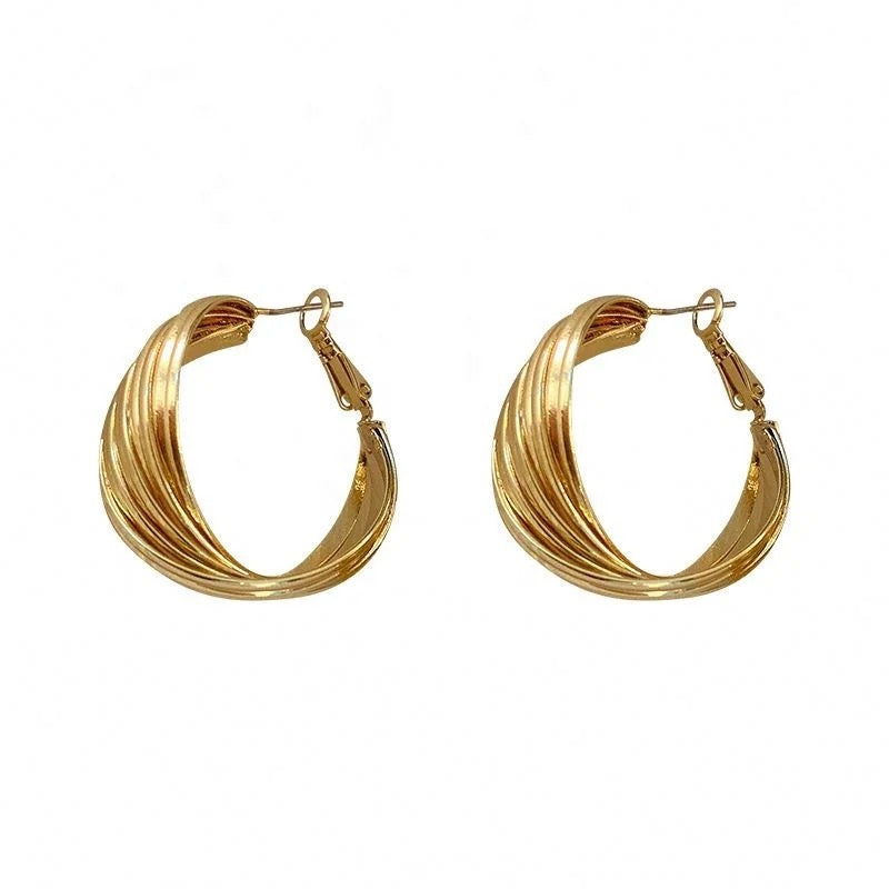 Gold Spiral Huggie Earrings