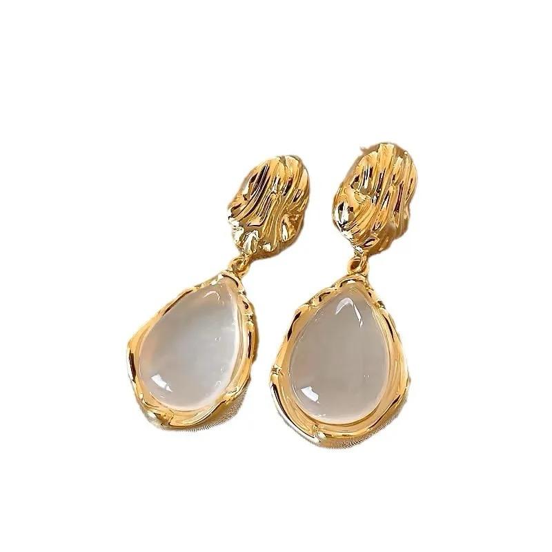 Gold pearl drop shape drop earrings